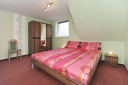 Ferienhaus „Sonne“ - Schlafzimmer 1