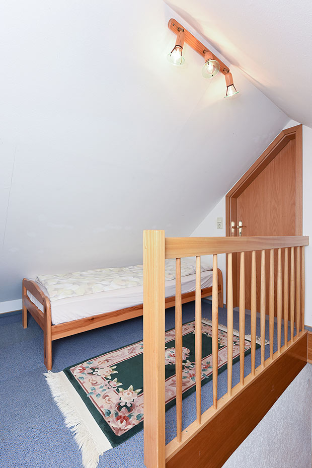 Ferienwohnung „Möwe“ im „Haus Sassenhof“ - Wohnzimmer mit Schlafempore