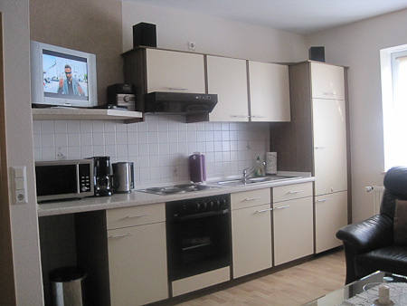 Ferienwohnung Haus „Abendstern“ - Wohnzimmer mit integriertem Küchenbereich