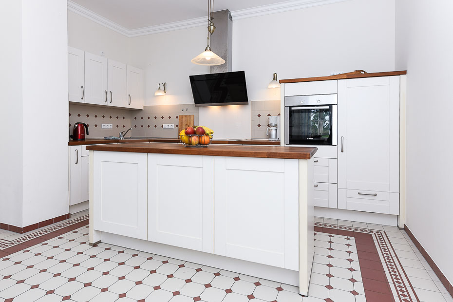 Ferienhaus „Hof Altensiel“ - Küche mit räumlich abgeteiltem Esszimmer im Erdgeschoss