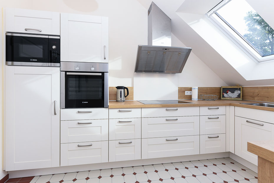 Ferienhaus „Hof Altensiel“ - Küche mit räumlich abgeteiltem Esszimmer im Obergeschoss