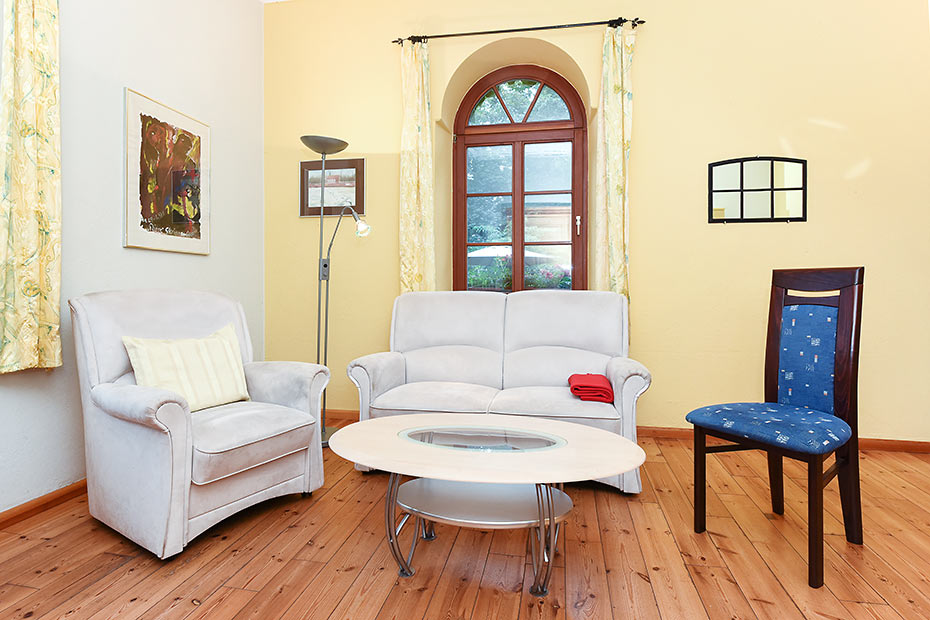 Appartement - Wohnzimmer mit integriertem Küchenbereich