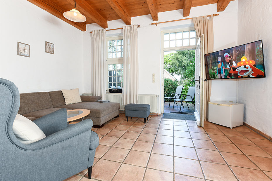 Ferienwohnung „Taubenschlag“ - Wohnzimmer mit integriertem Küchenbereich