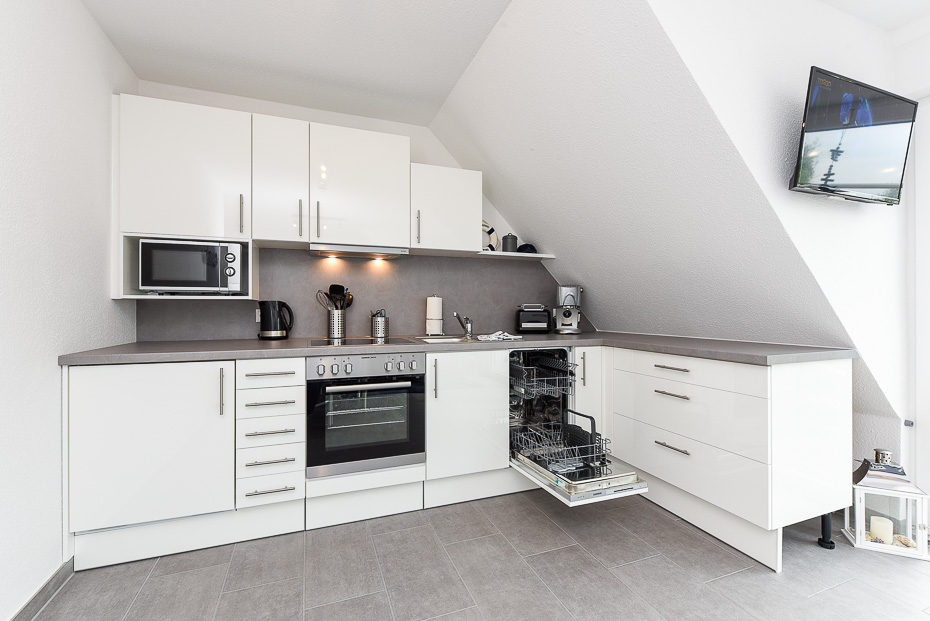 Ferienwohnung „ANKERmal“ - Wohnzimmer mit integriertem Küchenbereich