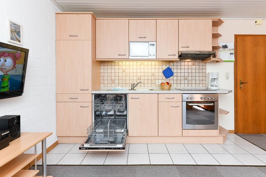 Ferienwohnung „Grön Land“ - Wohnzimmer mit integriertem Küchenbereich