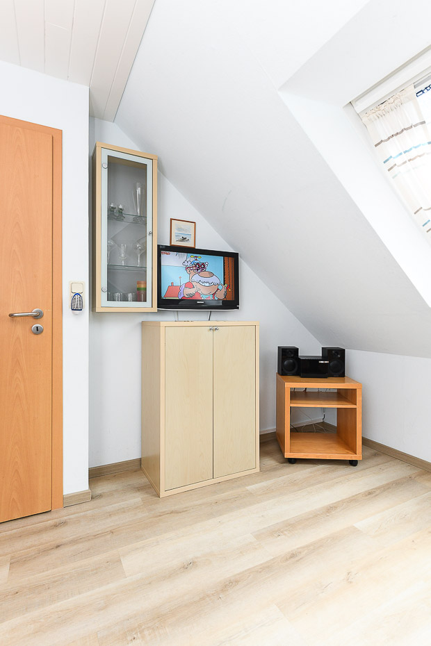 Ferienwohnung „Inselblick“ - Wohnzimmer mit integriertem Küchenbereich