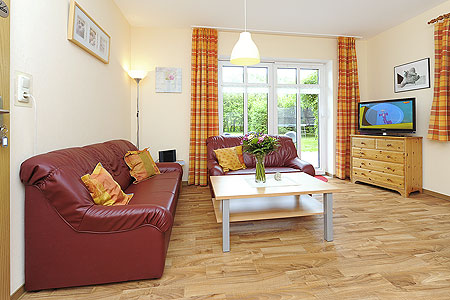Ferienwohnung „Flut“ - Wohnzimmer mit integriertem Küchenbereich