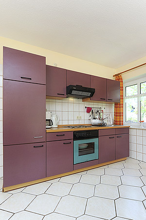 Ferienwohnung „Robbe“ - Wohnzimmer mit integriertem Küchenbereich