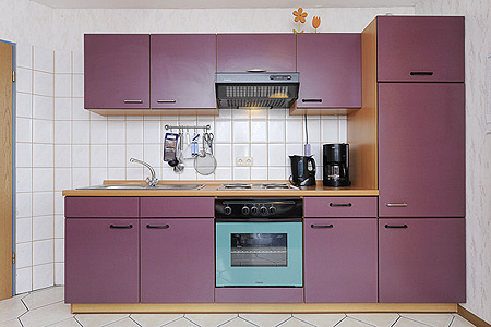 Ferienwohnung „Seehund“ - Wohnzimmer mit integriertem Küchenbereich