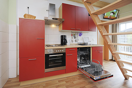 Ferienwohnung „Strand“ - Wohnzimmer mit integriertem Küchenbereich