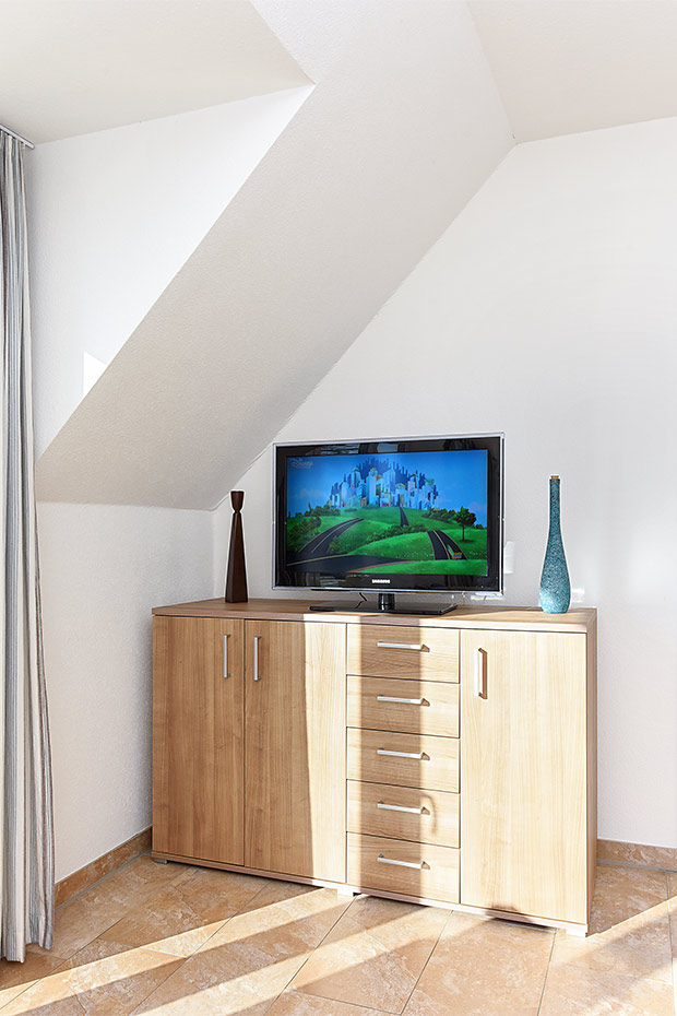 Ferienwohnung „Mittelriff“ - Wohnzimmer mit integriertem Küchenbereich