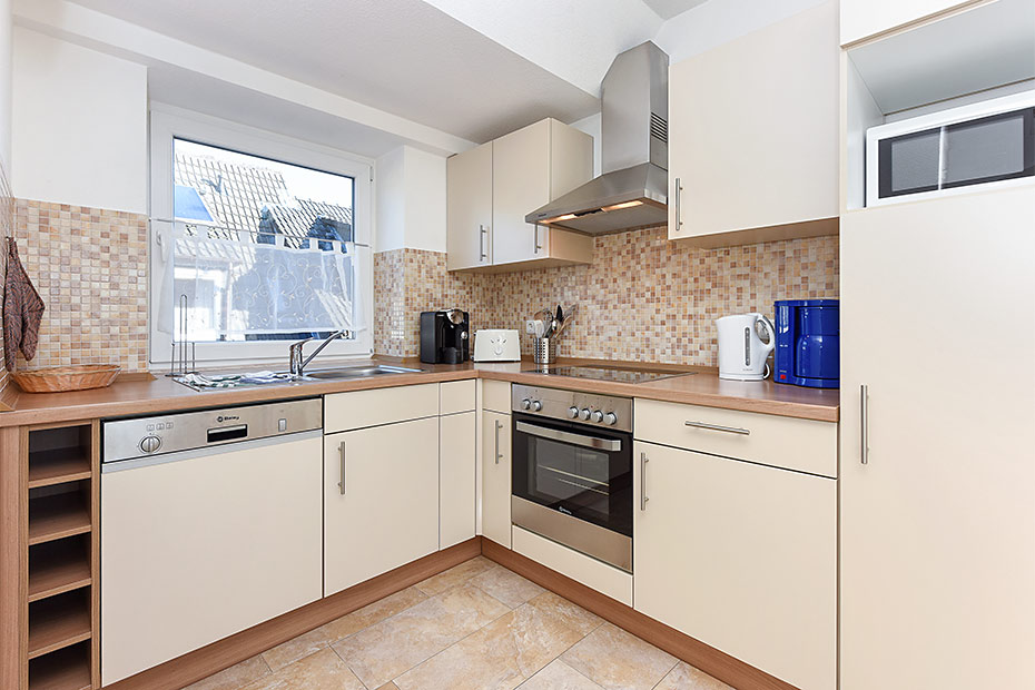 Ferienwohnung „Mittelriff“ - Wohnzimmer mit integriertem Küchenbereich