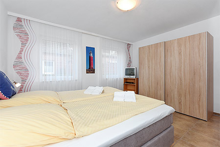 Ferienwohnung „Robbenplate“ - Schlafzimmer 1