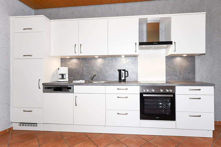 Ferienwohnung „Ebbe“ - Wohnzimmer mit integriertem Küchenbereich