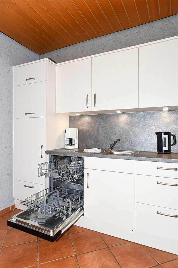 Ferienwohnung „Ebbe“ - Wohnzimmer mit integriertem Küchenbereich