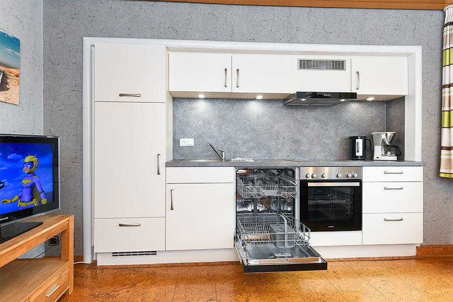 Ferienwohnung „Flut“ - Wohnzimmer mit integriertem Küchenbereich