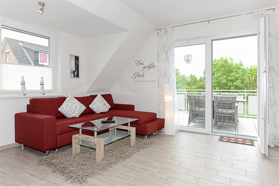 Ferienwohnung „Deichliebe“ - Wohnzimmer mit integriertem Küchenbereich