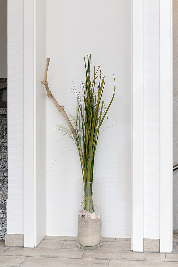 Ferienwohnung „Deichliebe“ - Wohnzimmer mit integriertem Küchenbereich