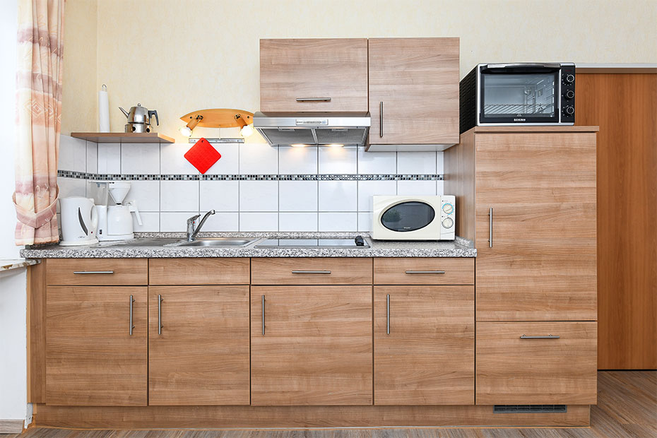 Ferienwohnung 1 - Wohnzimmer mit integriertem Küchenbereich