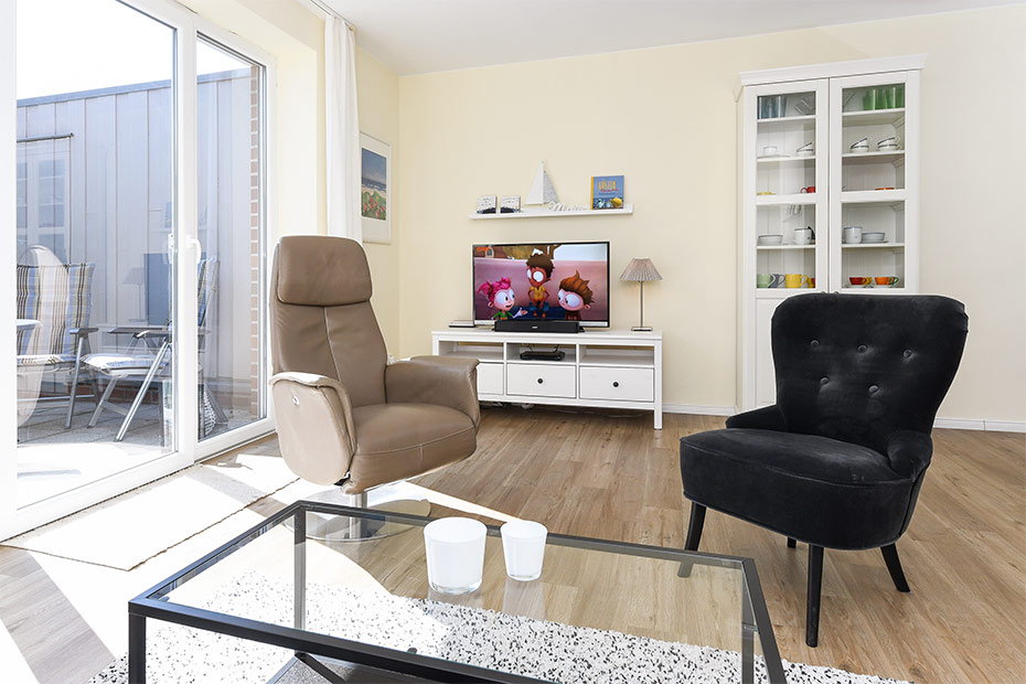 Ferienhaus „Seehuus“ - Wohnzimmer mit integriertem Küchenbereich