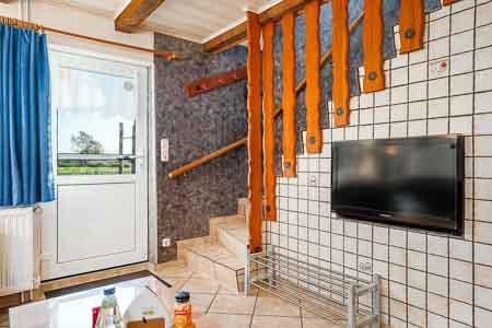 Ferienwohnung 1 - Wohnzimmer mit integriertem Küchenbereich