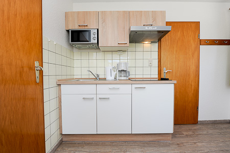 Ferienwohnung 8 - Wohnzimmer mit integriertem Küchenbereich