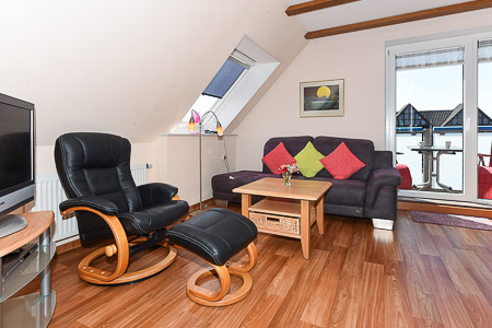 Apartment 6 - Wohnzimmer mit integriertem Küchenbereich