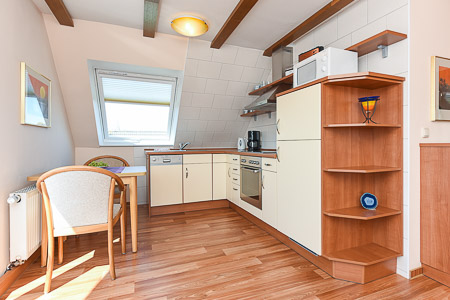 Apartment 6 - Wohnzimmer mit integriertem Küchenbereich