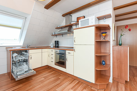 Apartment 6 - Wohnzimmer mit integriertem Küchenbereich