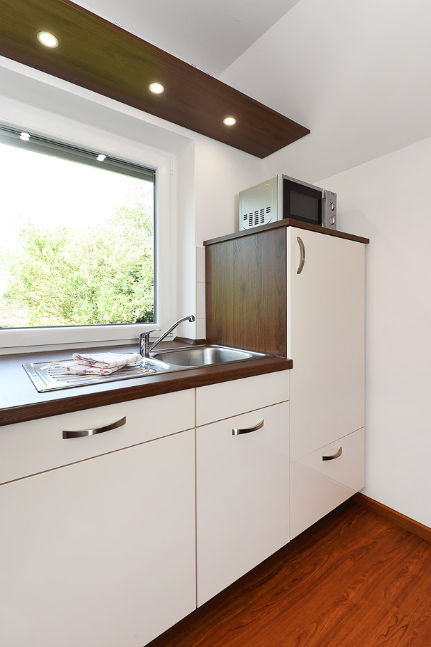 Ferienwohnung 3 - Wohnzimmer mit integriertem Küchenbereich