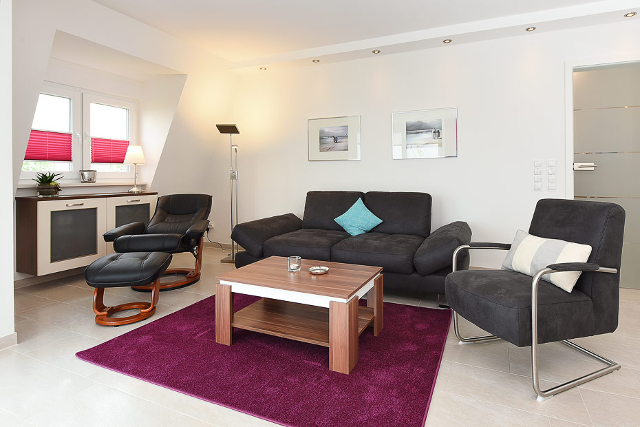 Ferienwohnung 12 - Wohnzimmer mit integriertem Küchenbereich