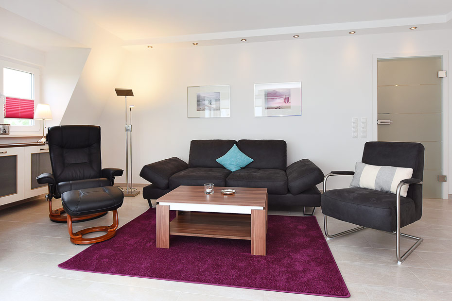 Ferienwohnung 12 - Wohnzimmer mit integriertem Küchenbereich