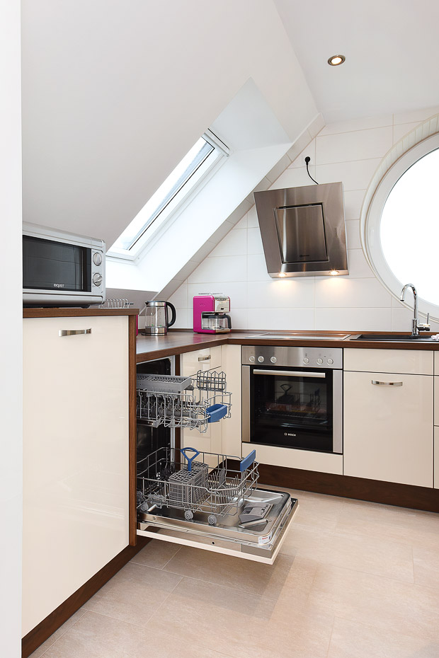 Ferienwohnung 13 - Wohnzimmer mit integriertem Küchenbereich