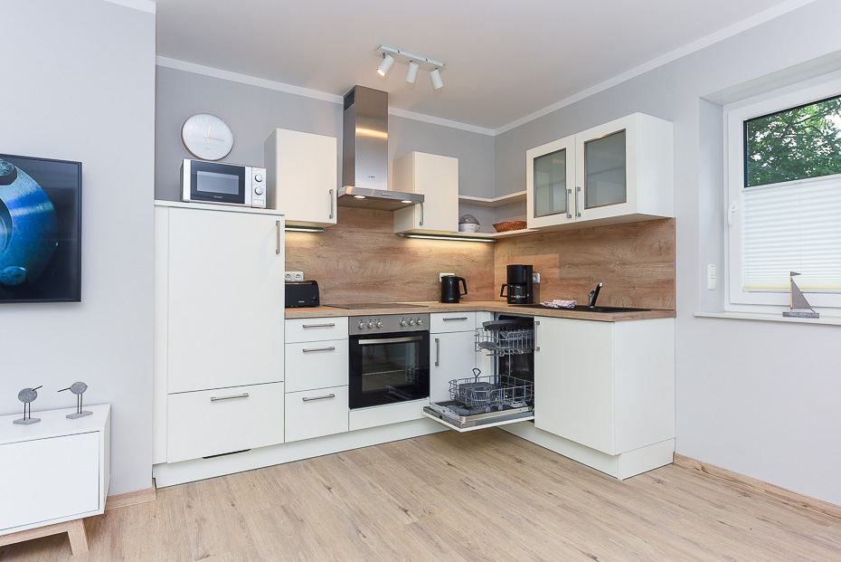 Ferienwohnung 14 - Wohnzimmer mit integriertem Küchenbereich