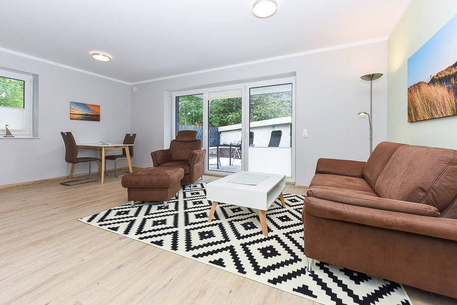 Ferienwohnung 14 - Wohnzimmer mit integriertem Küchenbereich