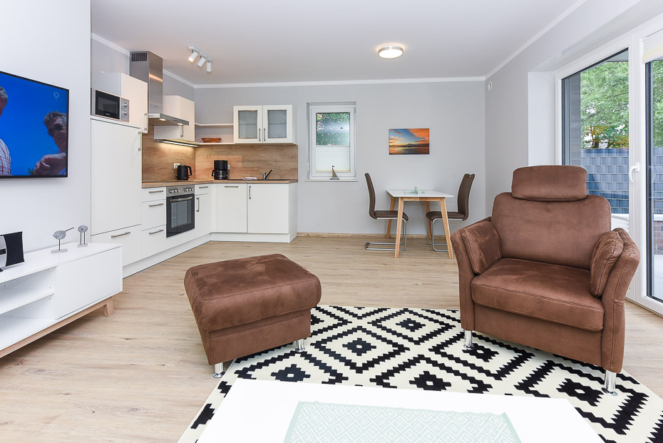 Ferienwohnung 14 - Wohnzimmer mit integriertem Küchenbereich
