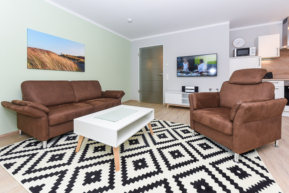 Ferienwohnung 14 - Wohnzimmer mit integriertem Küchenbereich