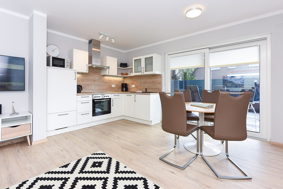 Ferienwohnung 15 - Wohnzimmer mit integriertem Küchenbereich