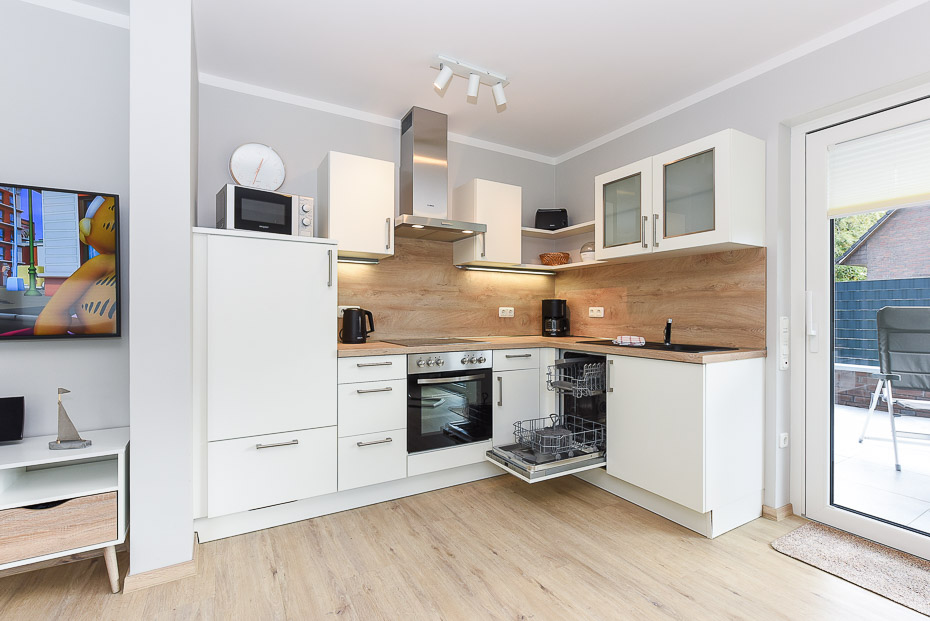 Ferienwohnung 15 - Wohnzimmer mit integriertem Küchenbereich