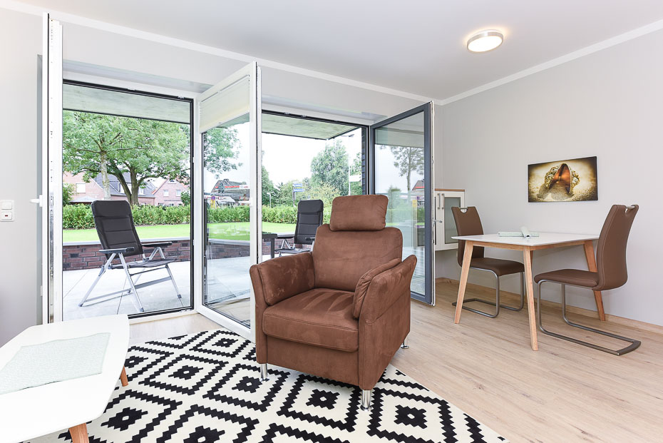 Ferienwohnung 16 - Wohnzimmer mit integriertem Küchenbereich