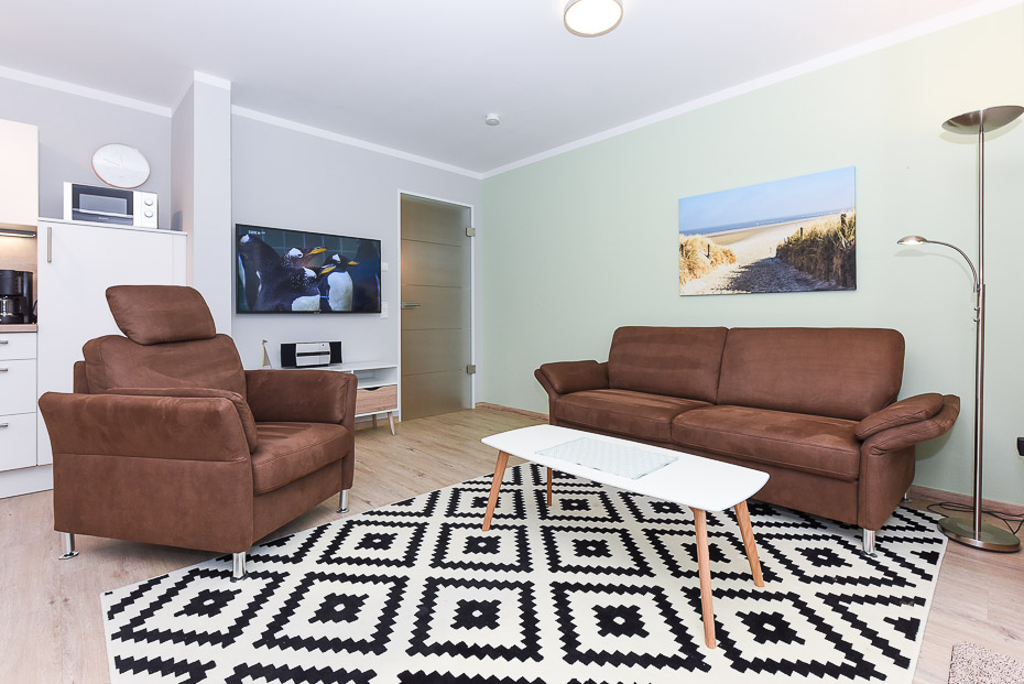 Ferienwohnung 16 - Wohnzimmer mit integriertem Küchenbereich