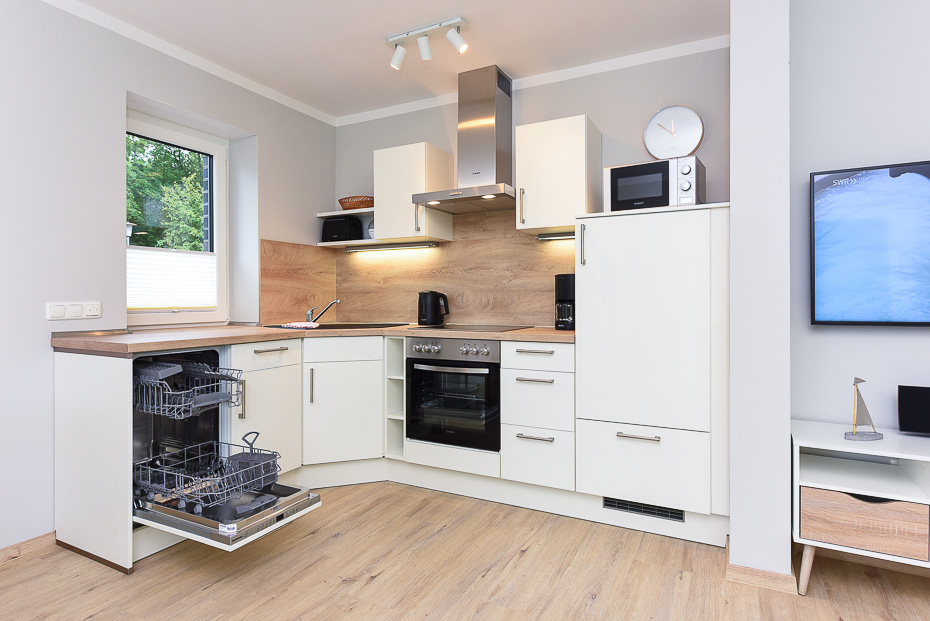 Ferienwohnung 16 - Wohnzimmer mit integriertem Küchenbereich