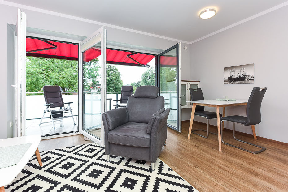 Ferienwohnung 19 - Wohnzimmer mit integriertem Küchenbereich