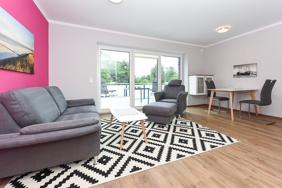 Ferienwohnung 19 - Wohnzimmer mit integriertem Küchenbereich