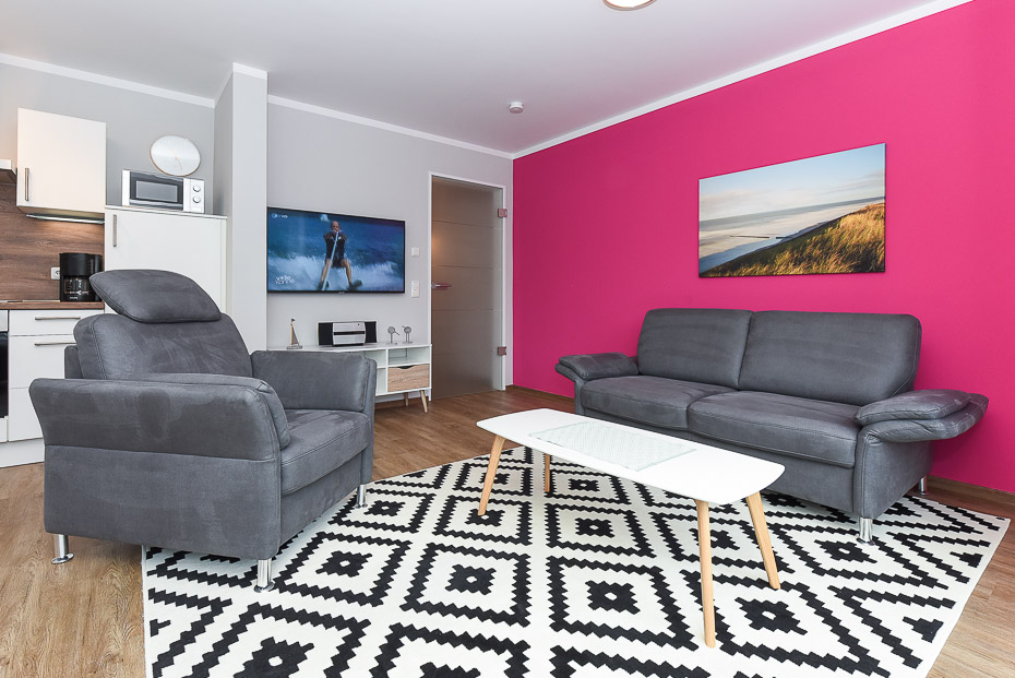 Ferienwohnung 19 - Wohnzimmer mit integriertem Küchenbereich