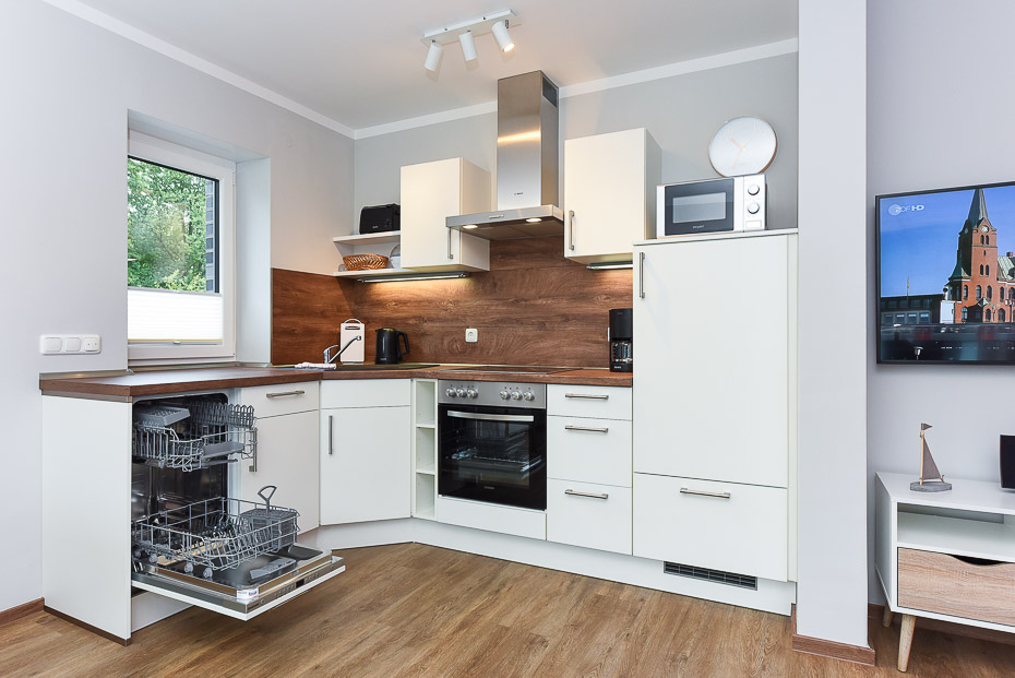 Ferienwohnung 19 - Wohnzimmer mit integriertem Küchenbereich