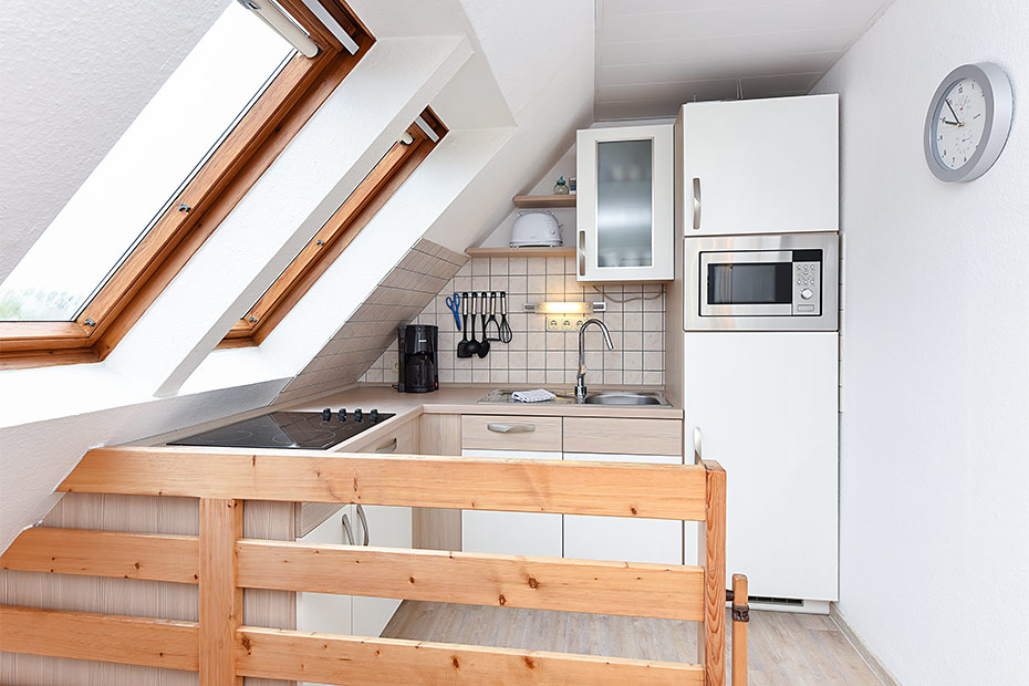 Ferienwohnung „Deichgraf“ - Wohnzimmer mit integriertem Küchenbereich