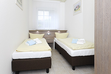 Ferienwohnung „Sonnensegel“ - Schlafzimmer 1