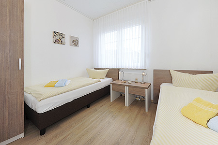 Ferienwohnung „Wellenreiter“ - Schlafzimmer 2/Kinderzimmer