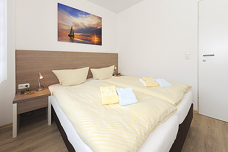 Ferienwohnung „Wellenreiter“ - Schlafzimmer 1